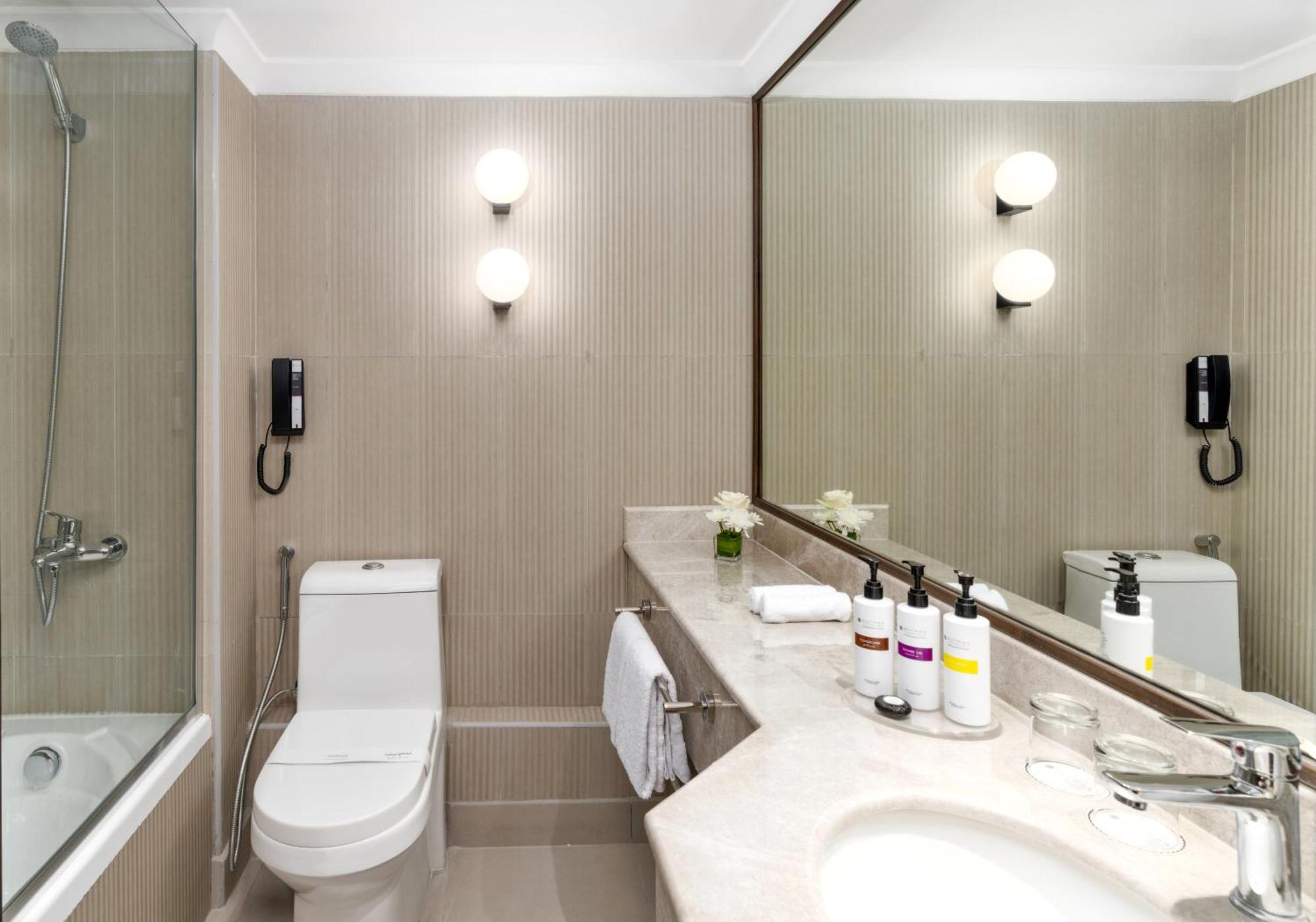 Suite Présidentielle Deluxe avec Lit Double et 2 Lits Simples - Vue sur Ville